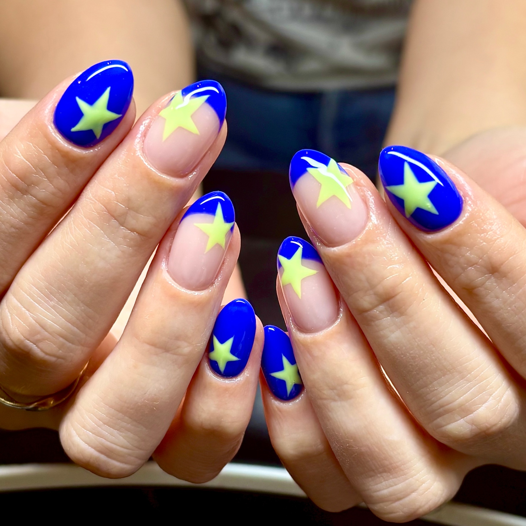 Cobalt blue nails with neon yellow star french tips